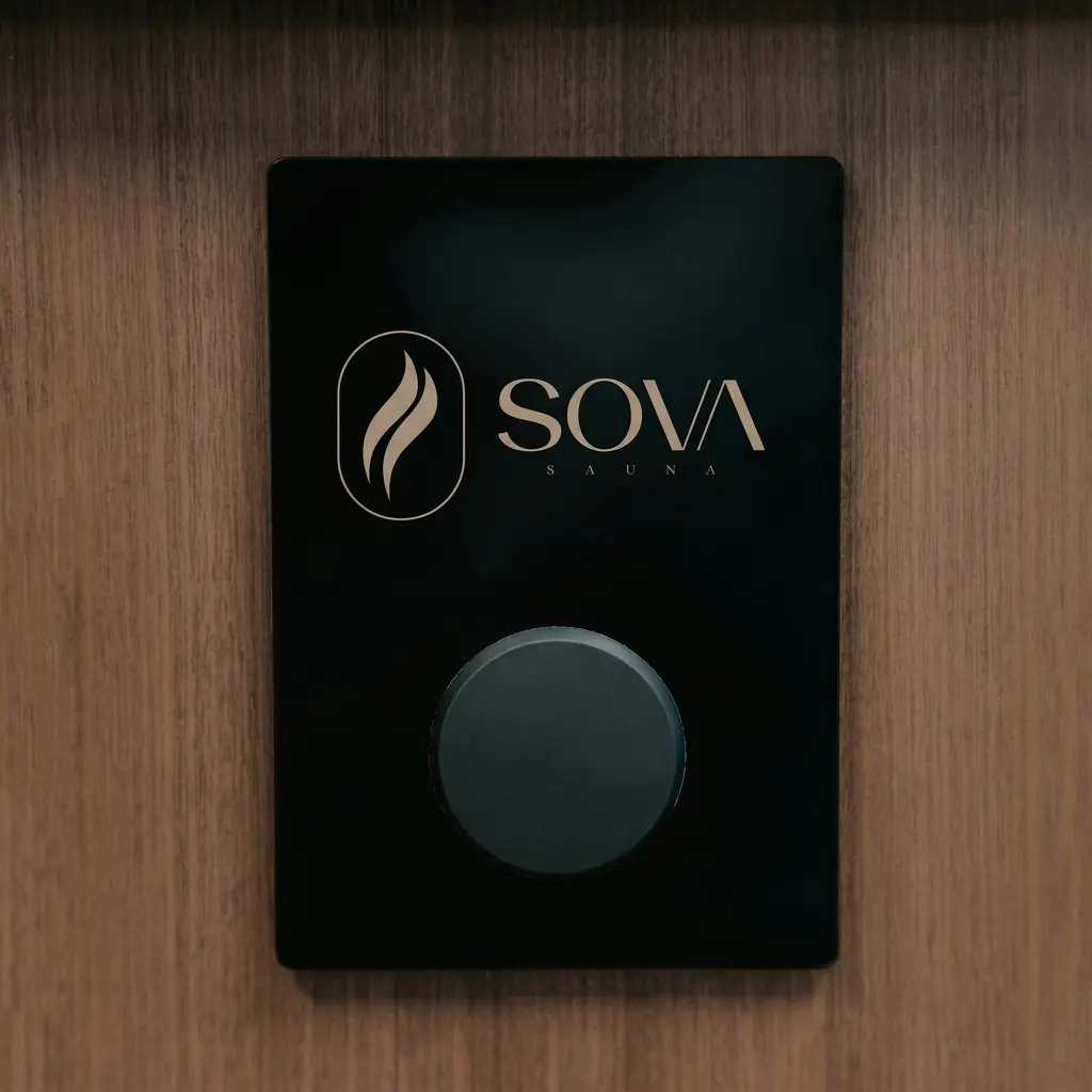 A SOVA-branded control panel with a round dial mounted on a timber wall